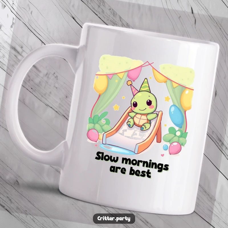 Funny Kawaii turtle character happily sliding down a party slide, depicted on a mug for slow, cheerful enjoyment.