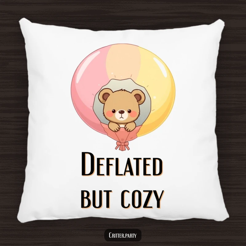 Funny decorative pillow with a curious bear cub peeking out of a popped balloon, soft, plush, and humorous accent for sofas.