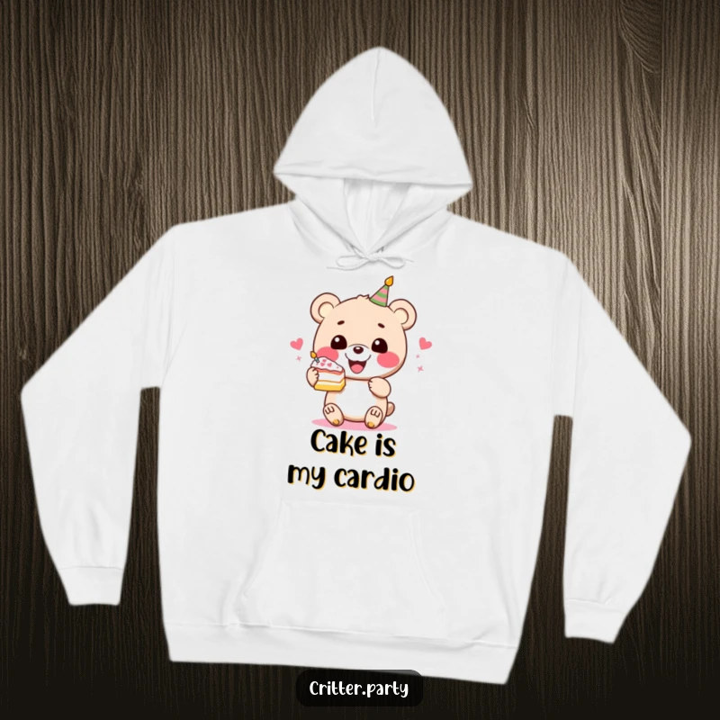 Funny bear cake hoodie with a perky bear character gleefully holding a delicious slice of festive cake, perfect for staying warm.