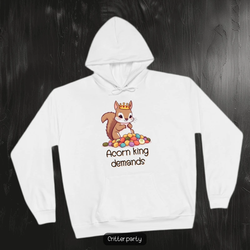 Funny hoodie with a regal squirrel wearing a small crown, overseeing a bountiful pile of tasty treats, designed for cozy indulgence.