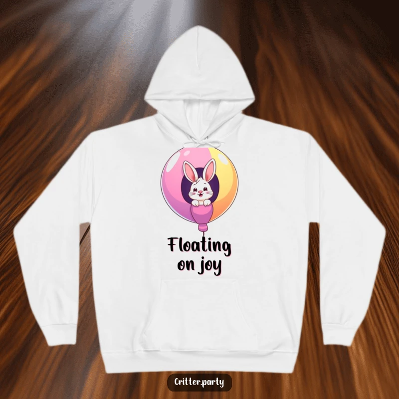Funny hoodie featuring a giggling bunny character peeking out from a giant, colorful balloon, offering warmth and playful charm.