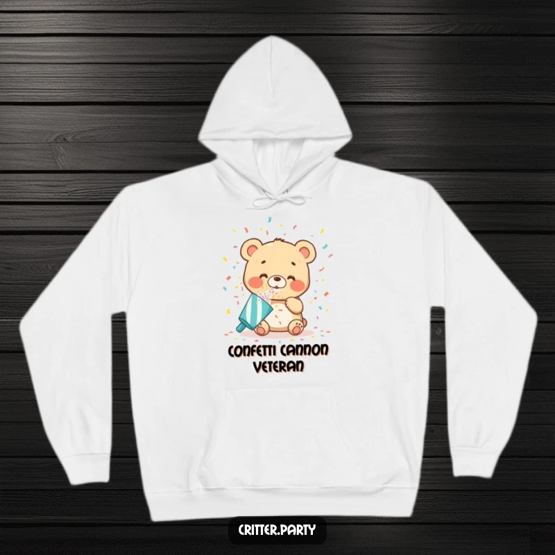 Funny bear cub hoodie blowing oversized colorful confetti from a party popper, embodying pure delight and festive energy, great for a humorous present.