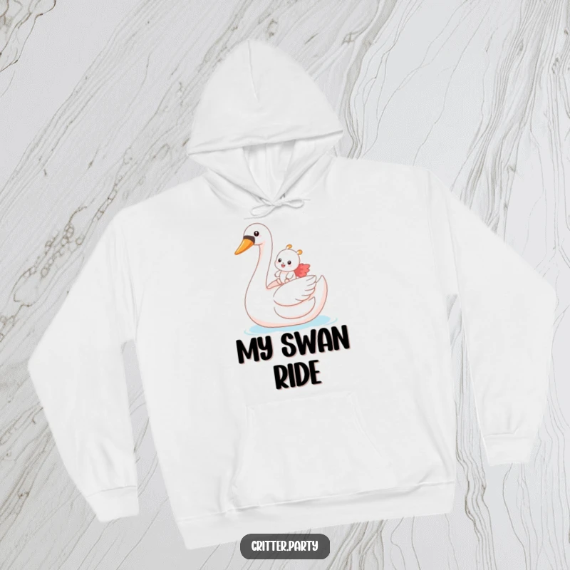 Funny hoodie depicting a small critter joyfully riding an oversized inflatable swan, radiating a sense of whimsical adventure.