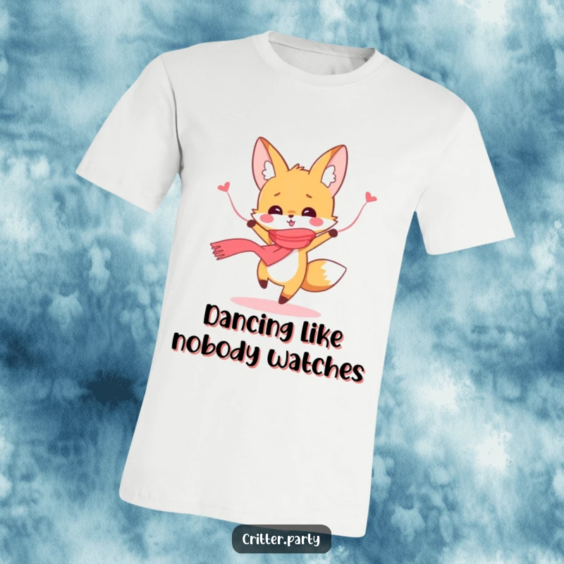Funny cute fox character joyfully dancing while wearing a colorful streamer as a scarf, printed on a soft t-shirt.