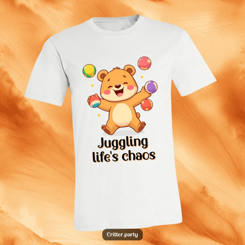 Funny t-shirt showing an excited bear cub joyfully juggling colorful balls with a huge, happy smile.